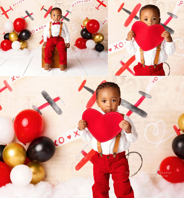 Atlanta baby photographer, toddler holding heart for valentine milestone session