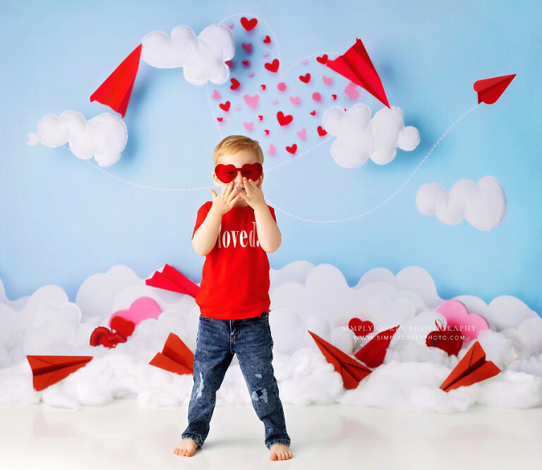 Atlanta baby photographer, toddler in heart glasses for Valentine's studio session