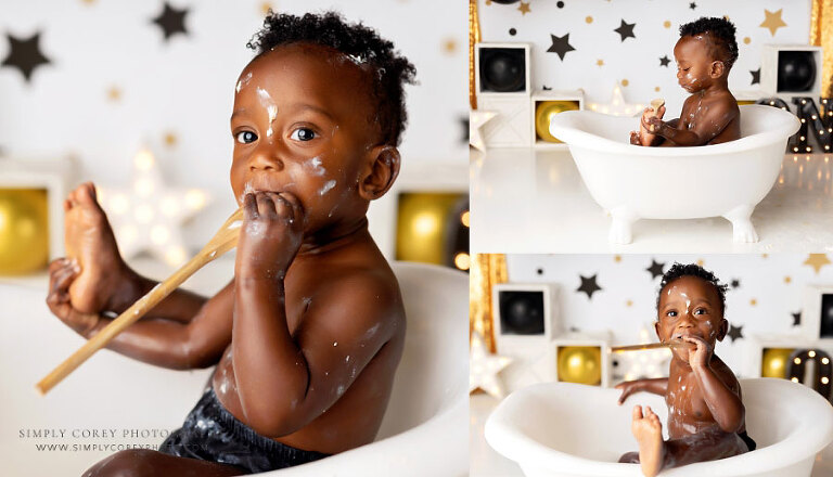 baby photographer near Fairburn, boy in tub after black gold cake smash session