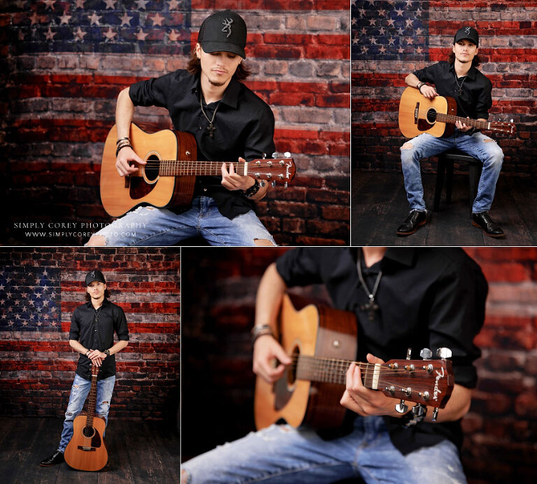 senior portrait photographer near Newnan, teen boy with guitar and American flag backdrop