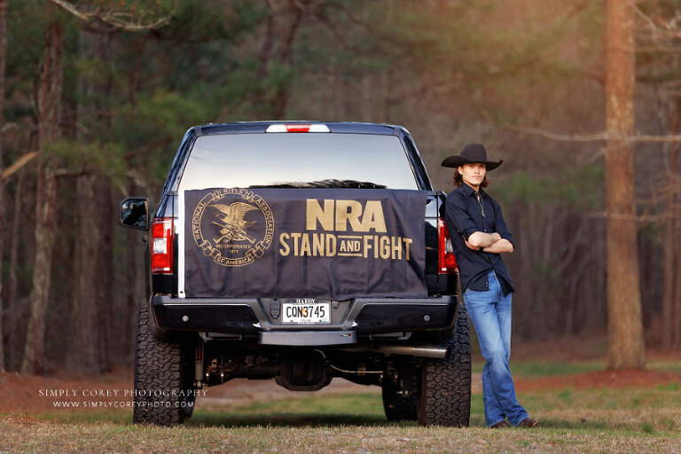 West Georgia senior portrait photographer, teen boy with NRA flag on truck