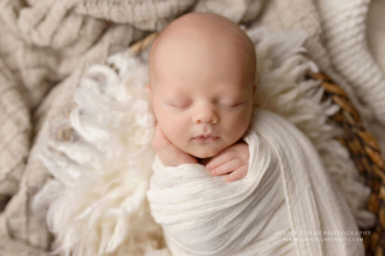 newborn photographer near Newnan, swaddled baby boy with neutral colors
