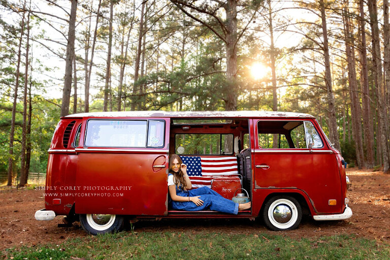 Hiram senior portrait photographer, teen girl in overalls and sunglasses in VW Bus