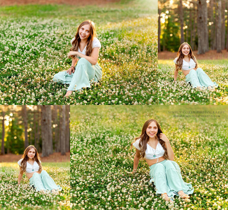 senior portrait photographer near Hiram, teen girl sitting outside in grass and clover