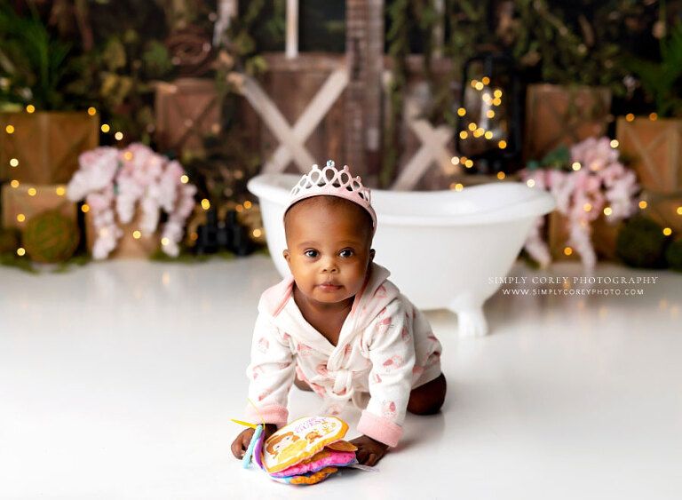 Newnan baby photographer, girl in robe after bath for explorer cake smash