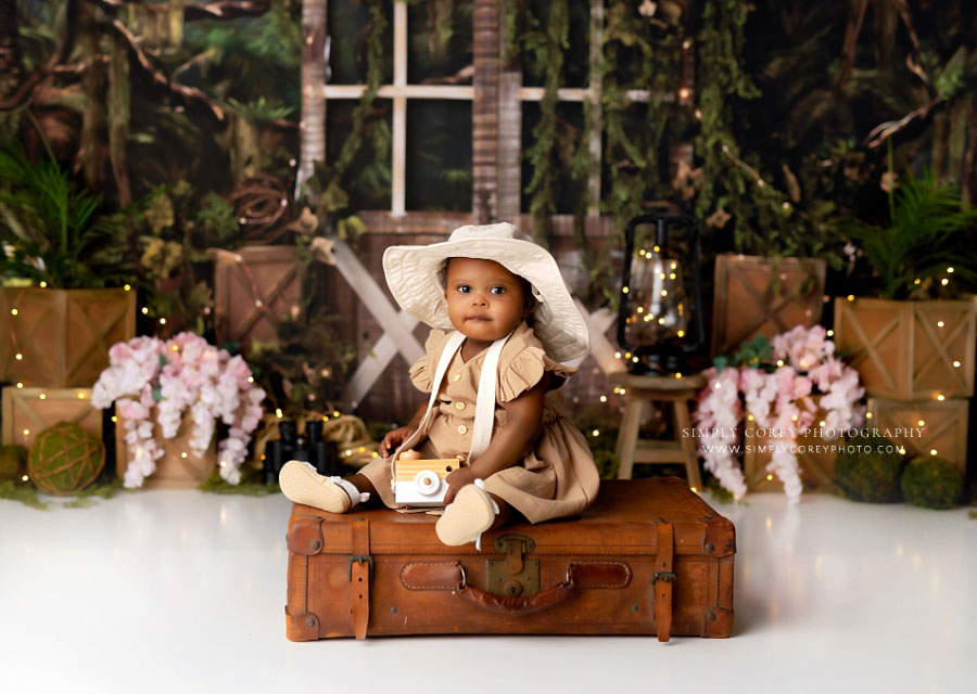 Tyrone baby photographer, girl on suitcase for explorer cake smash set