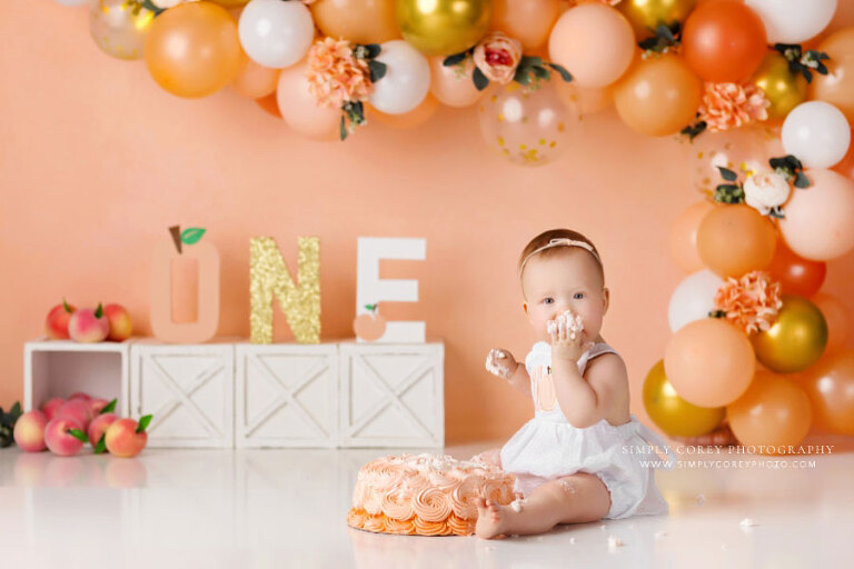 cake smash photographer near Villa Rica, studio peach theme for baby girl