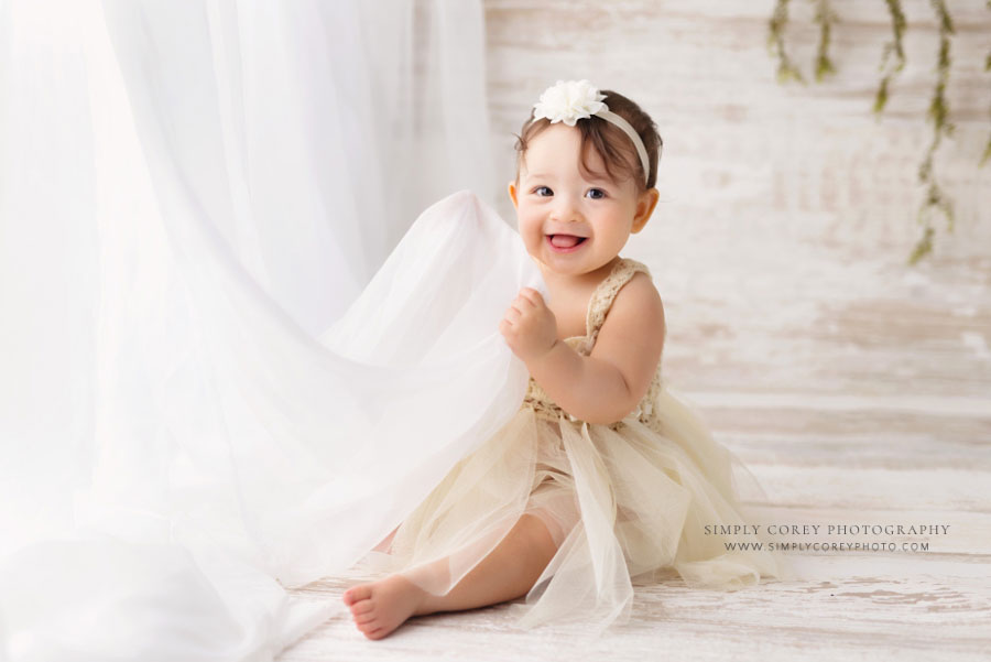 Villa Rica baby photographer, boho milestone session with white curtains