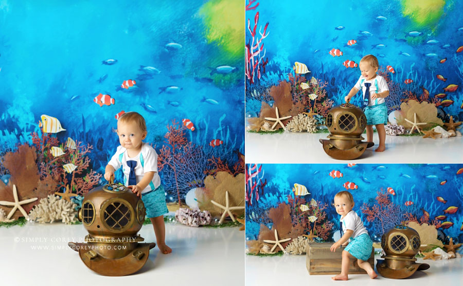 baby photographer near Powder Springs, boy with diving mask for ocean cake smash