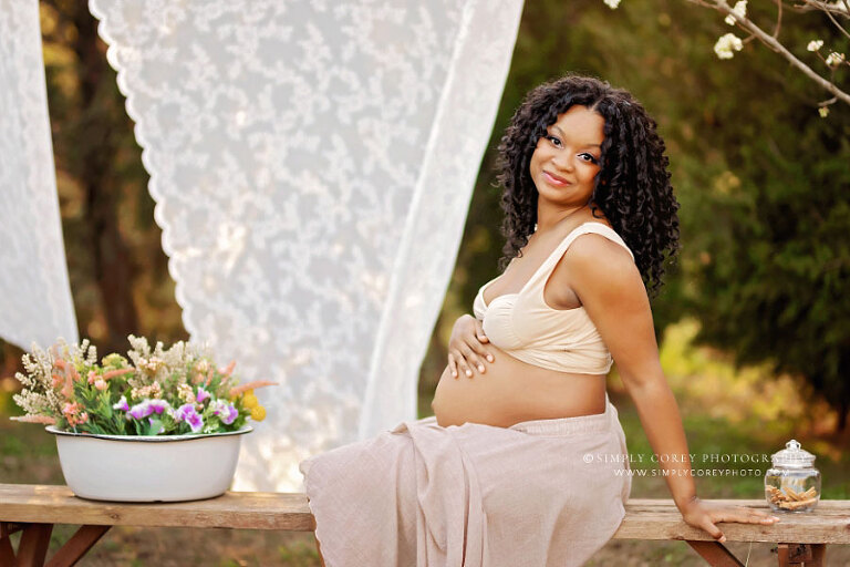 maternity photographer near Carrollton, GA; boho outdoor set in spring