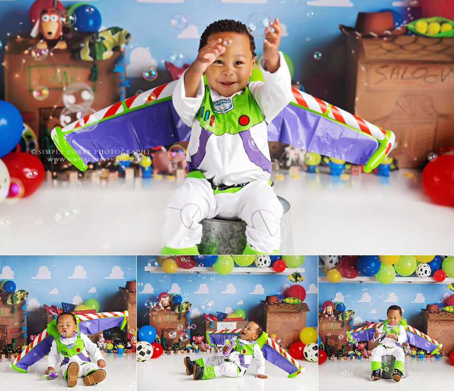 baby photographer near Powder Springs, playing with bubble during Buzz themed studio session