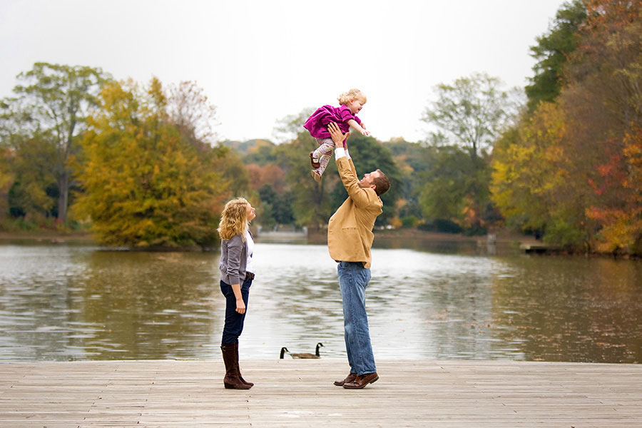 family photographer near Atlanta, portrait by pond at Piedmont Park