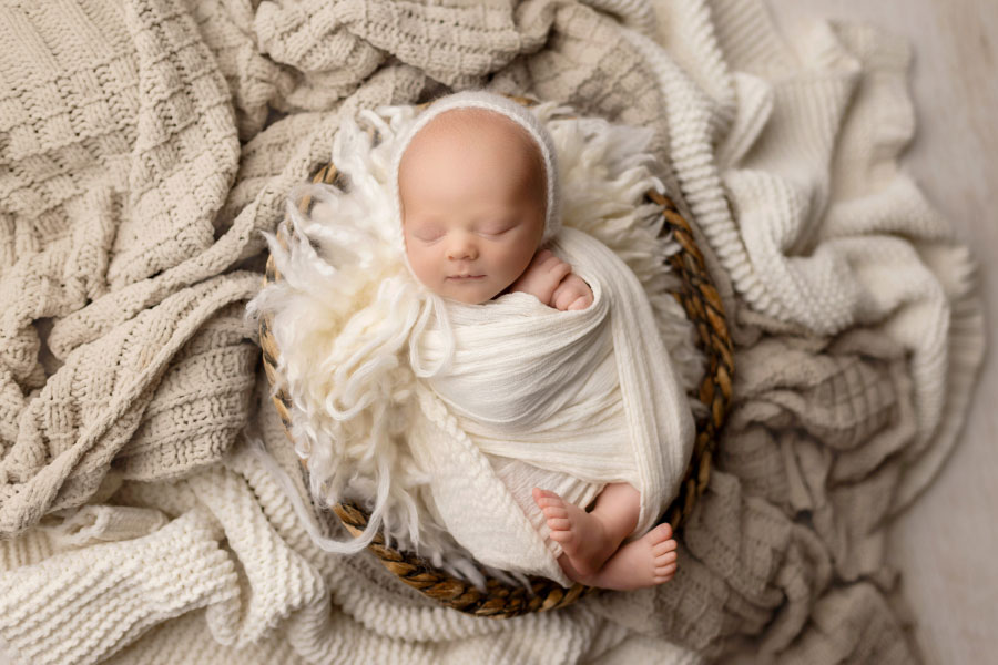 newborn photographer near Villa Rica, baby boy with neutral studio set