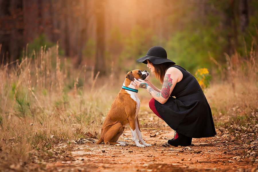Newnan family photographer, dog mom outside with boxer