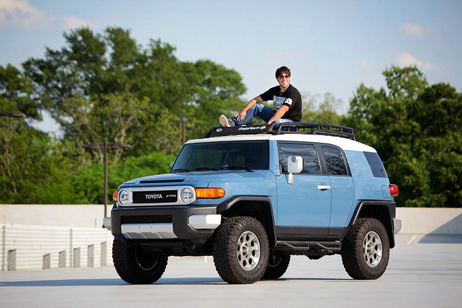 Villa Rica senior portraits, teen sitting on top of car at parking garage