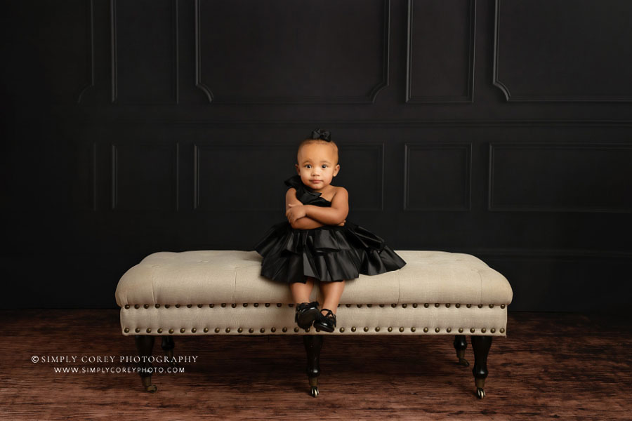 Atlanta baby photographer, studio portrait with black dress and backdrop