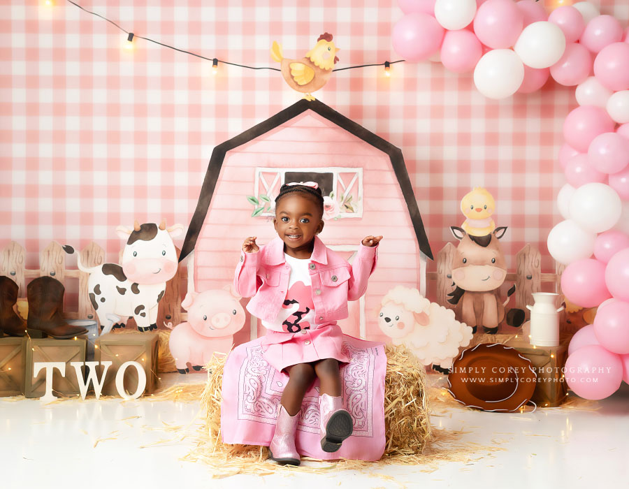 Fairburn children's photographer, pink farm studio set for baby girl's 2nd birthday