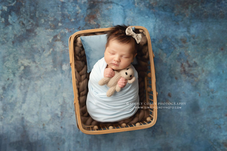 Newnan newborn photographer, baby girl in blue with teddy bear