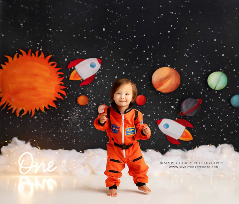 Atlanta baby photographer, boy in astronaut suit on outer space studio set