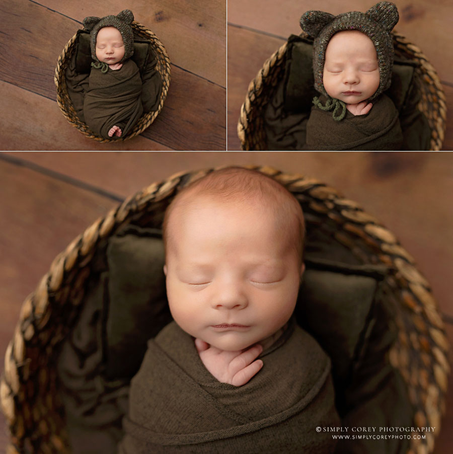 newborn photographer near Hiram, baby boy in dark green for studio session