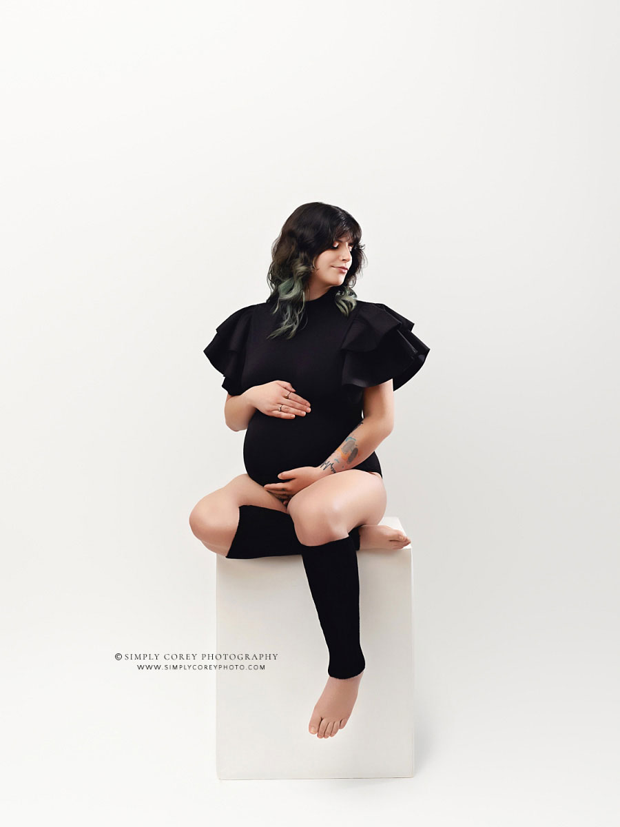Douglasville maternity photographer, studio session with white box and black leg warmers